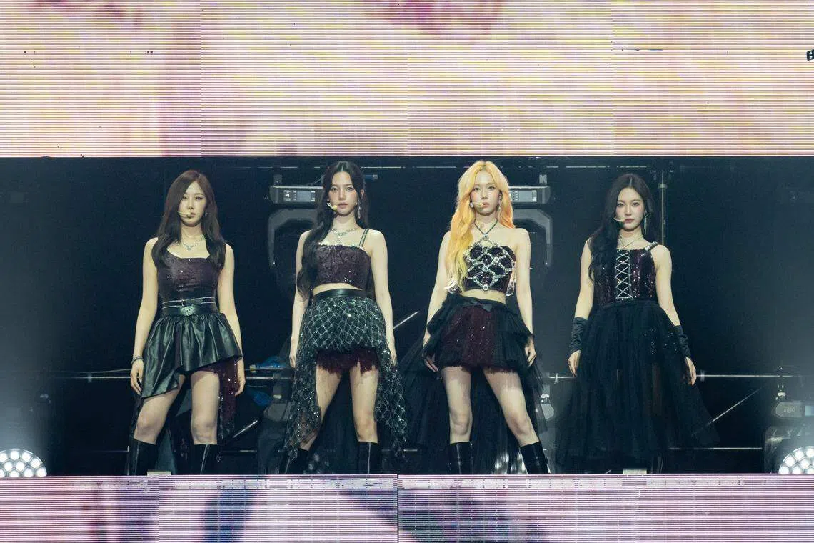 Giselle（左起）、Karina、Winter和Ningning在演唱会上以各自参与创作的歌曲呈献个人表演。（Rele提供）