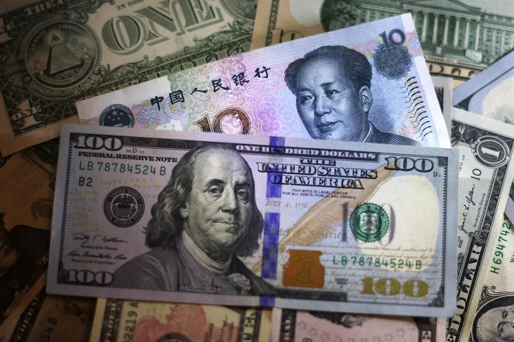 在岸人民币升破7元关口 写下两年半新高