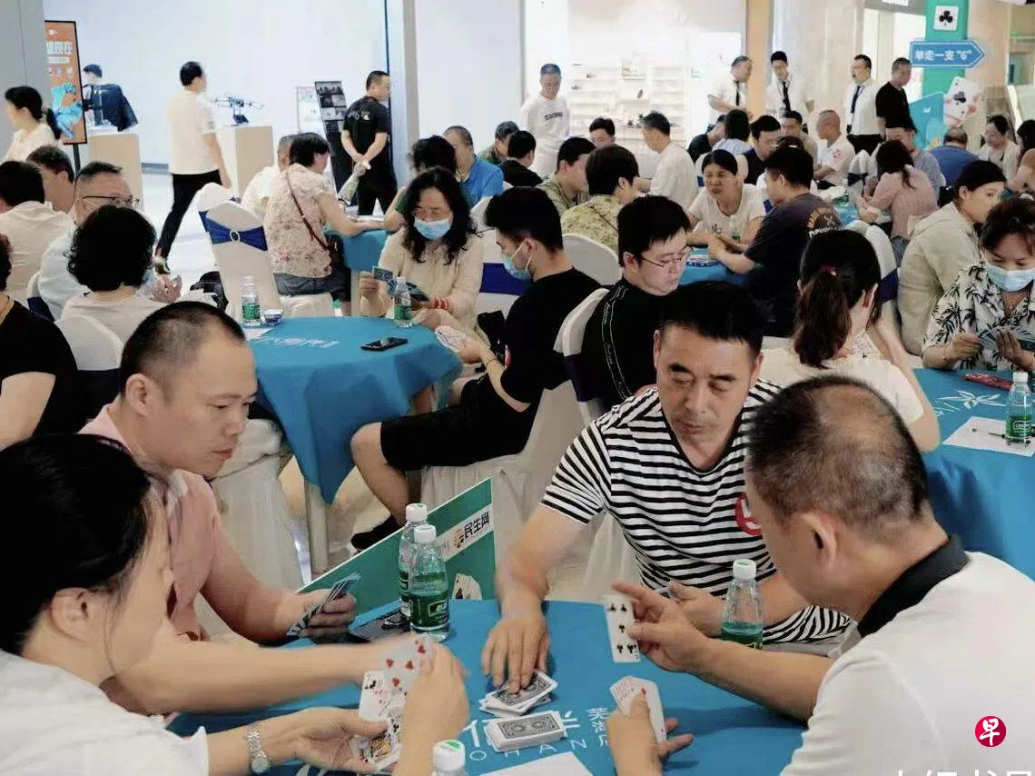 下午察：俘获金融和政务圈的“掼蛋”是什么？ | 联合早报