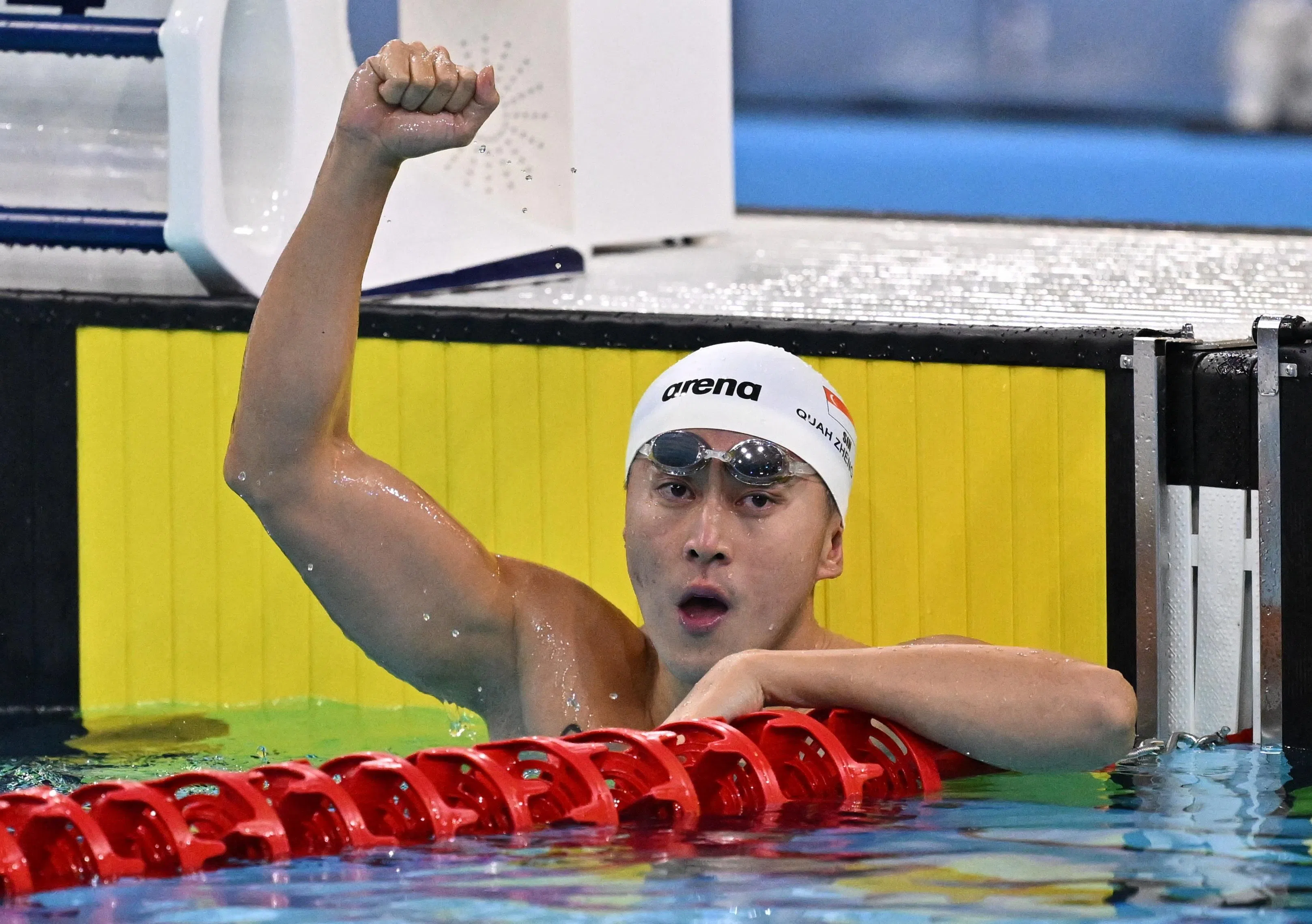 柯正文在男子100米蝶泳夺冠。（路透社）